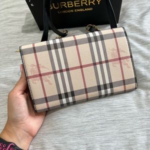 Cross body purse. Plaid print. Never used. Smoke free. Pet free home.